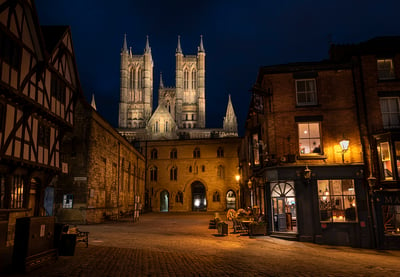 Bailgate and cathedral at night