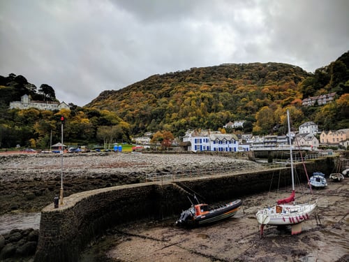 lynmouth harbour at low tide in autumn