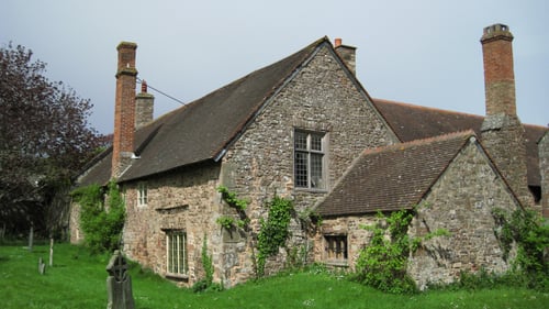 the grounds of the Priory, St George in Dunster, Somerset