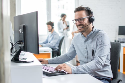 man answering call centre phone