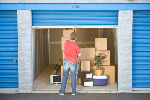 man closes door on storage closet