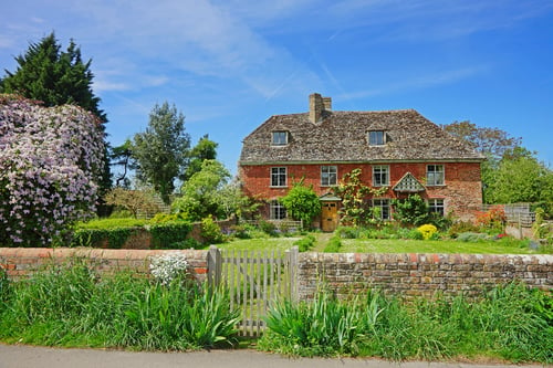 red brick cottage in heart of the Cotswolds
